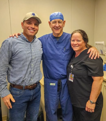 Chris Jackson shown here with Dr. Paul Thomas and Melanie Durham